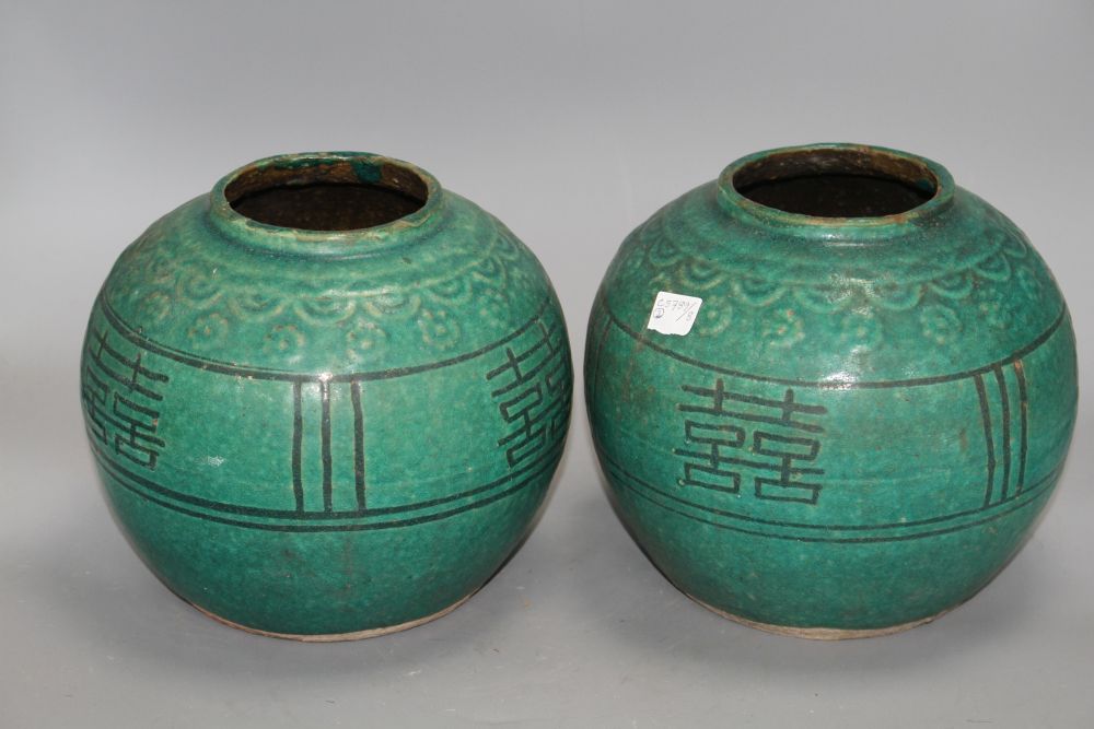 Two 19th century Chinese turquoise glazed shuangxi jars, with calligraphic motifs, height 18cm